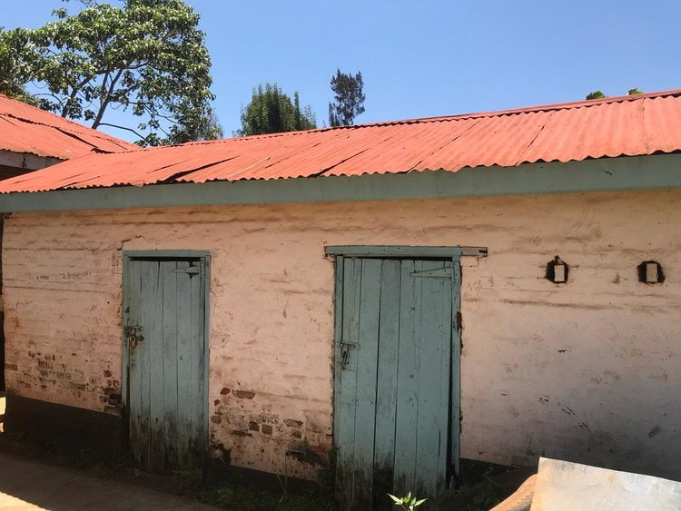 Solitary cells as they appear today in Kangubiri Girls High School (formerly Aguthi Works Camp). They are presently used as stores. Notice the doors turned upside down.